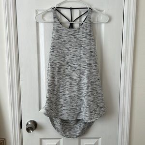 lululemon workout shirt with built in bra and low cut back. Size 8.